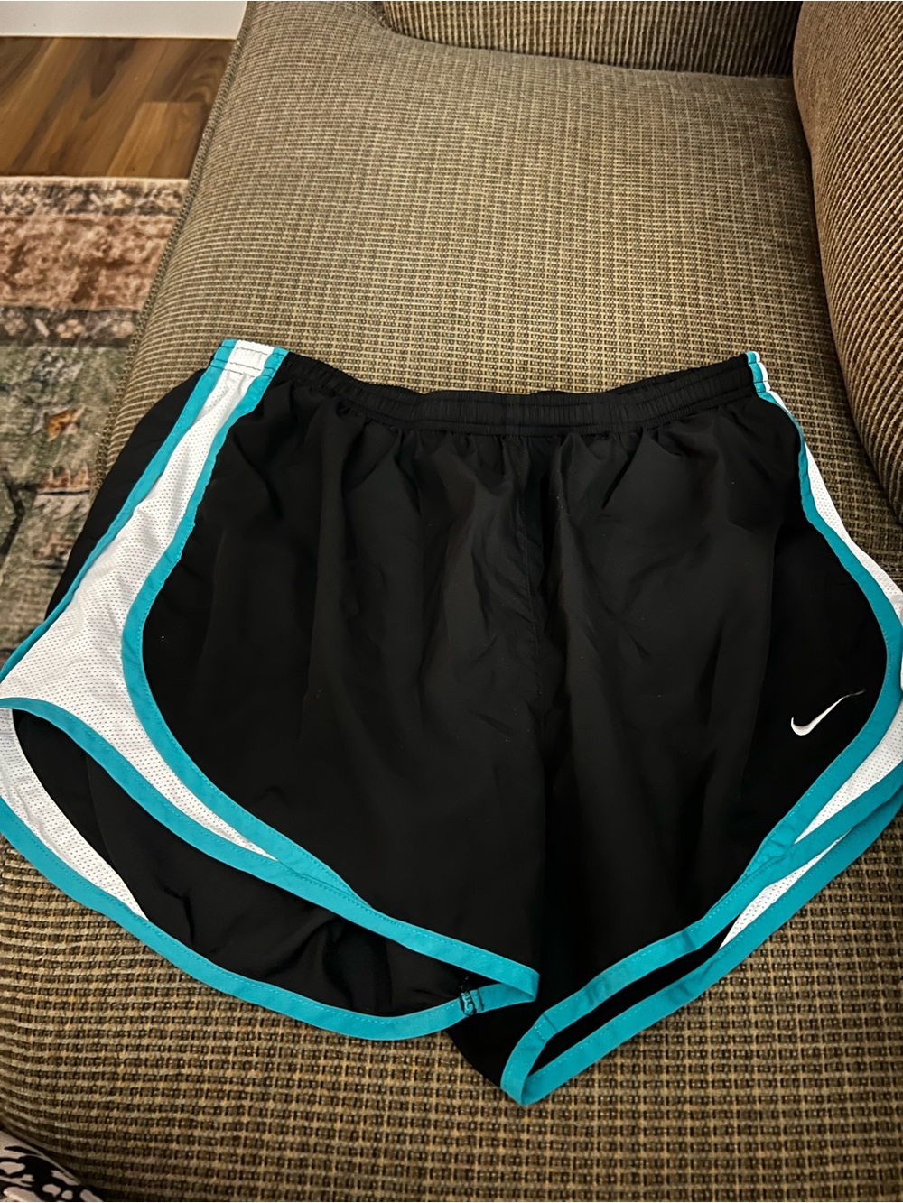 Nike Women’s Black Athletic Shorts with Teal Trim